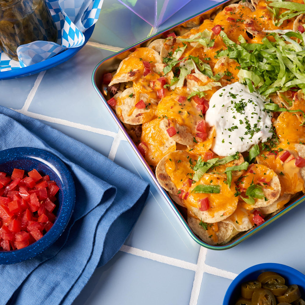 Tostitos salsa spooned onto tacos showing versatility and flavor-boost benefit
