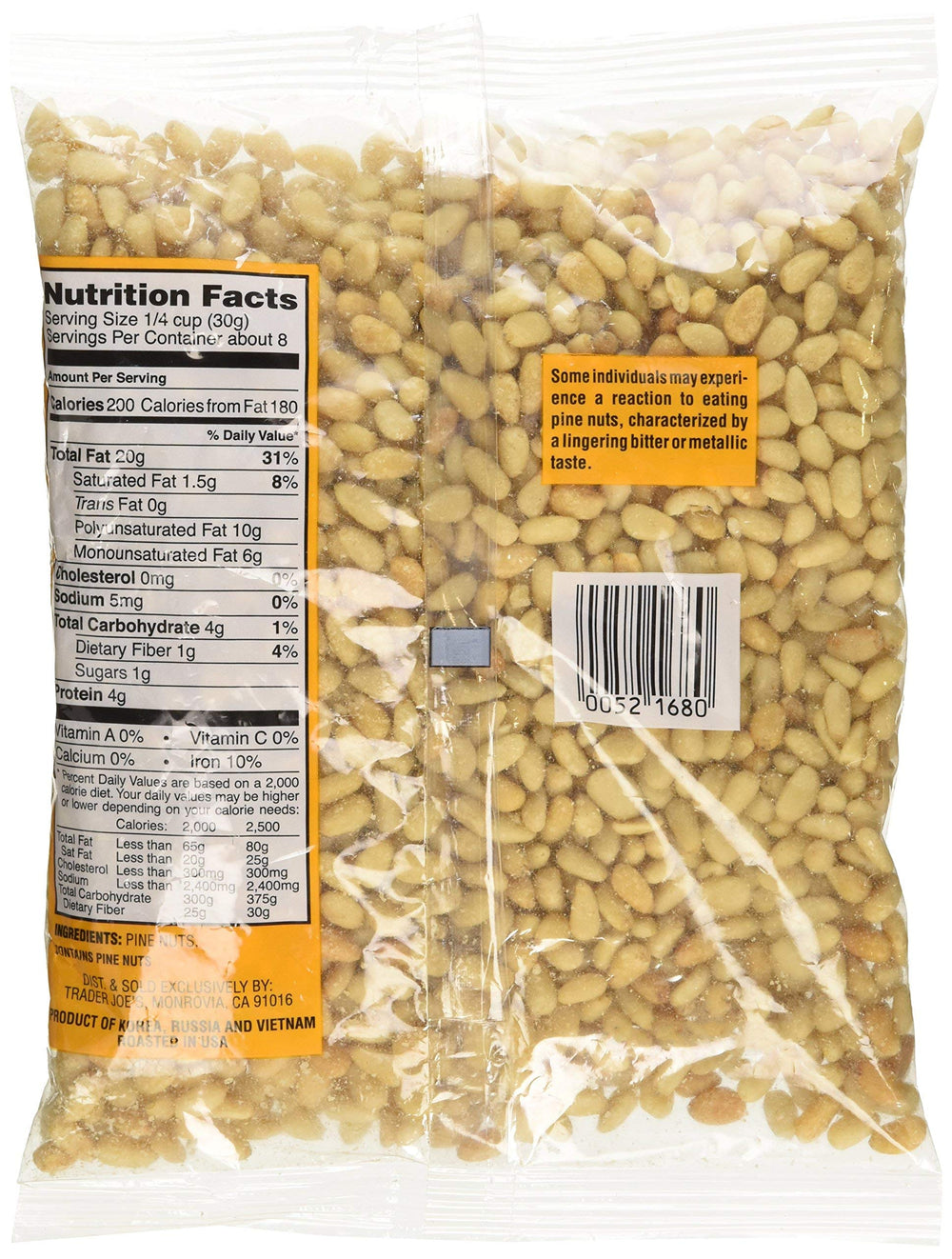 Trader Joe's close-up of toasted pignolias texture and color, highlighting crunchy toasted flavor