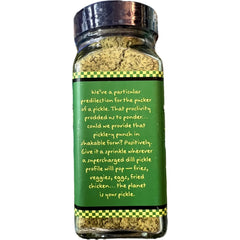 Trader Joe's bottle displayed with pickles and spices to show authentic pickle flavor