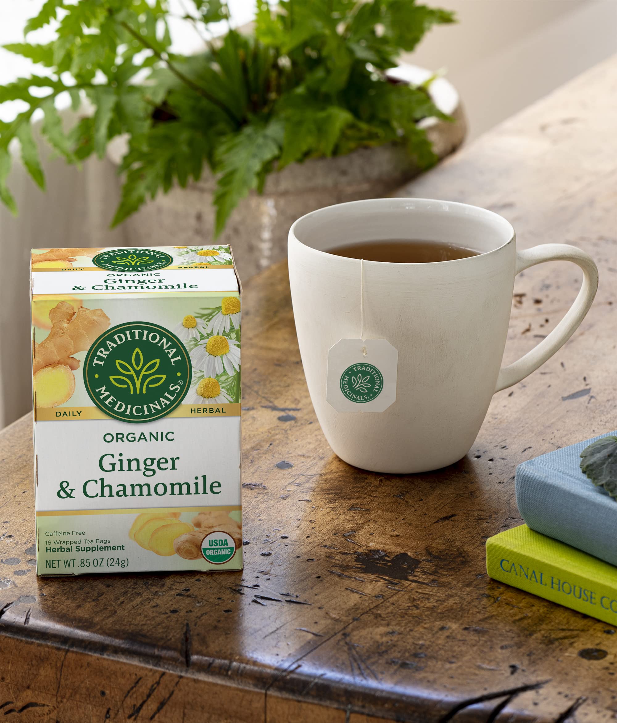 Traditional Medicinals cup on bedside table conveying calming, caffeine-free evening use