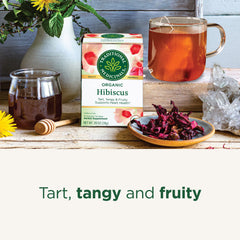 Traditional Medicinals brewed cup with deep red hibiscus tea offering bright, tart flavor