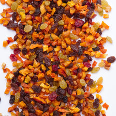 Traina fruit pieces folded into muffin batter for even distribution
