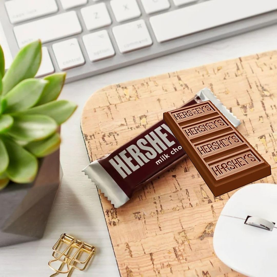 TREATBASKET close-up of an unwrapped mini milk chocolate bar highlighting smooth texture