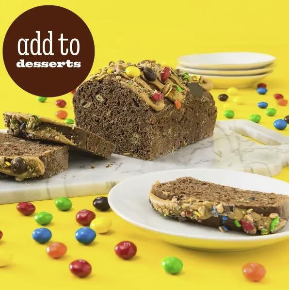 TREATBASKET M&M Peanut Butter close-up of candy shell and chocolate layers highlighting crunch