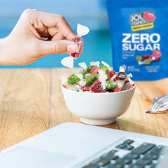 Treatizo candy in hand to show portion size and convenient portable snacking benefits