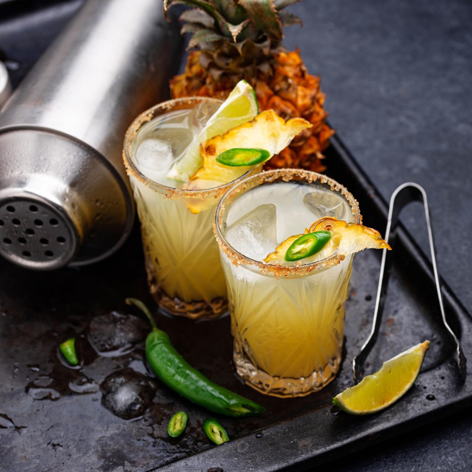 Tres Agaves bottle with jalapeño and limes showing fresh ingredient pairing benefit