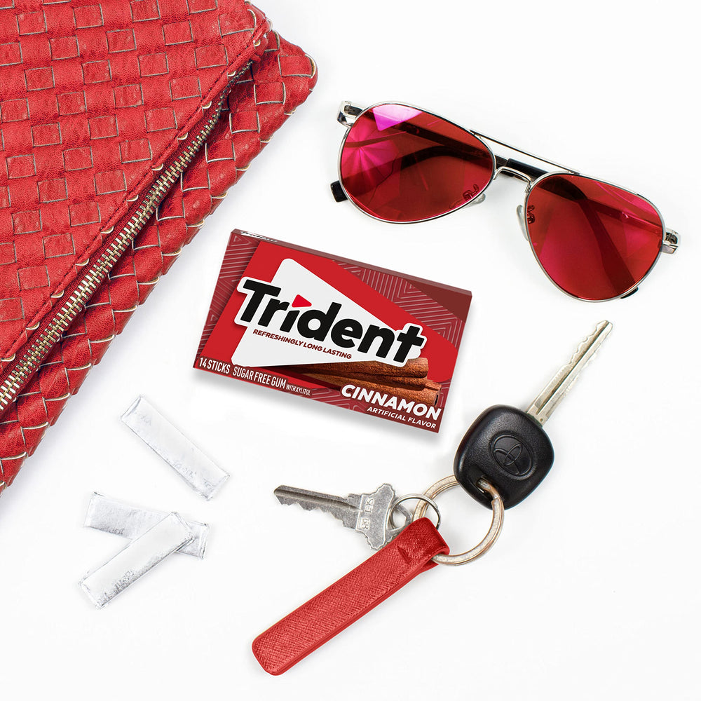Trident packs on office desk indicating workplace freshness and sharing