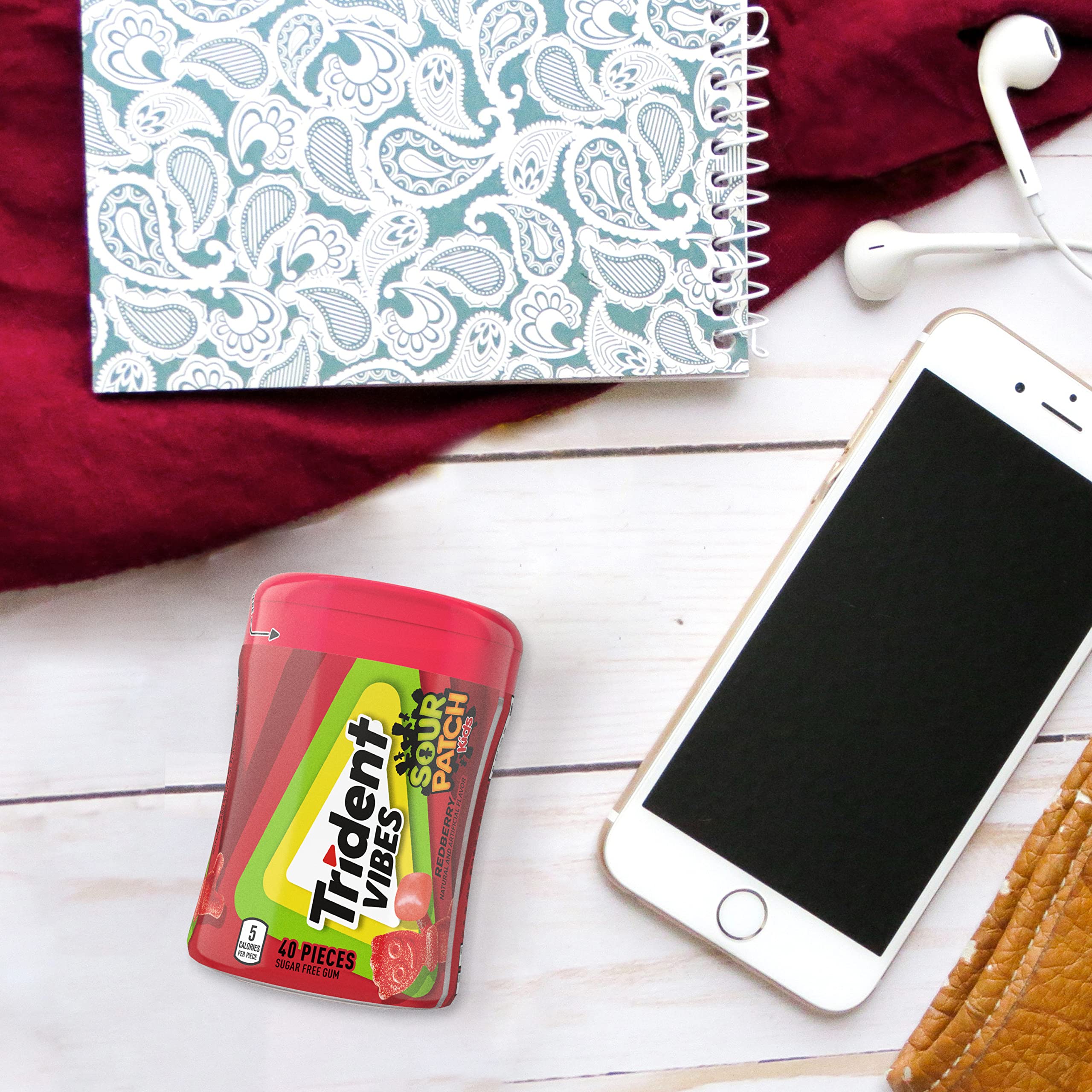 Trident bottle on office desk illustrating fresh breath and easy sharing