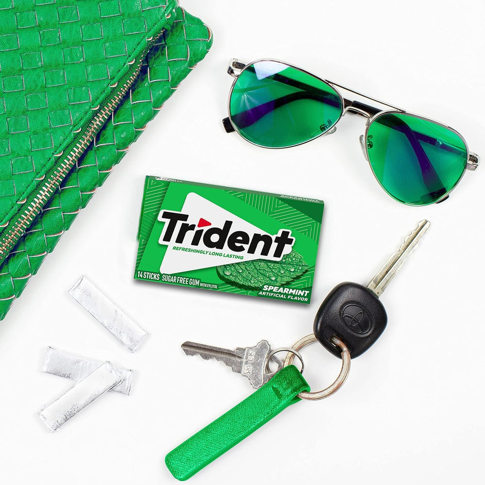 Group around a table sharing Trident packs for communal freshening convenience