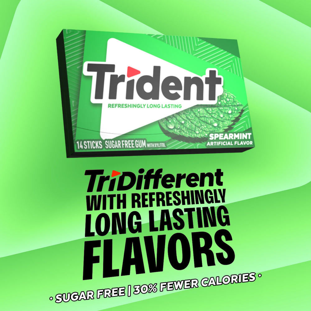 Hand holding Trident pack to show scale and pocket-friendly convenience