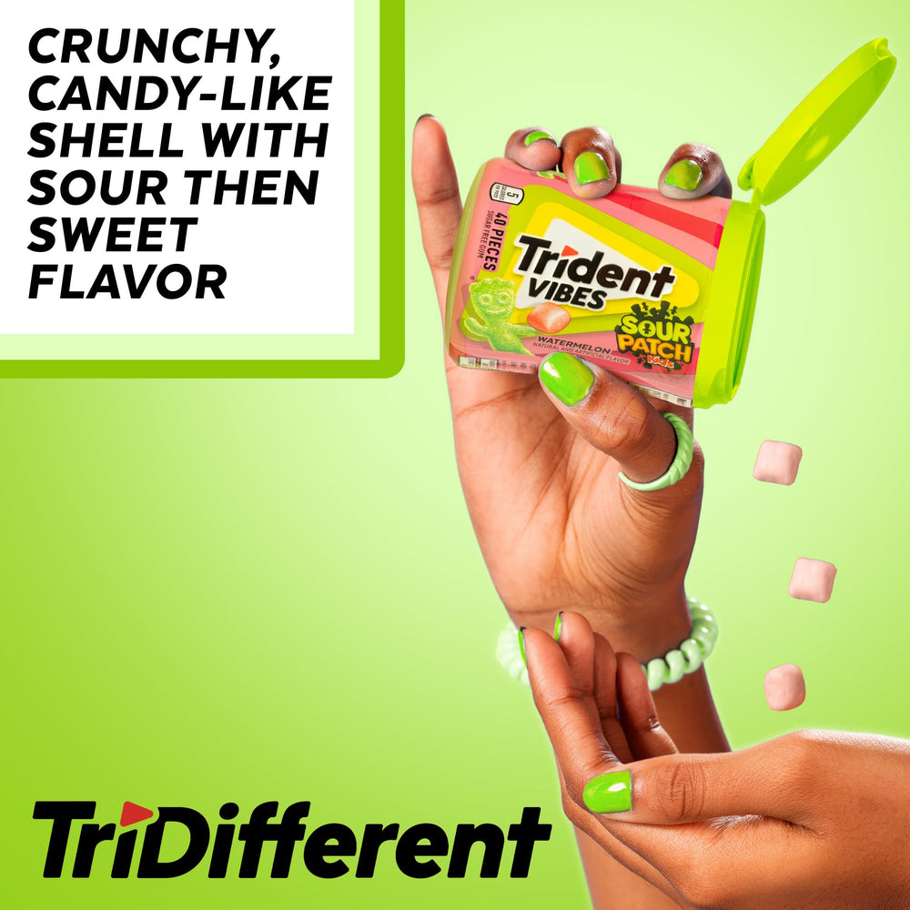 Trident Vibes gum pieces spread to show coated shell and color