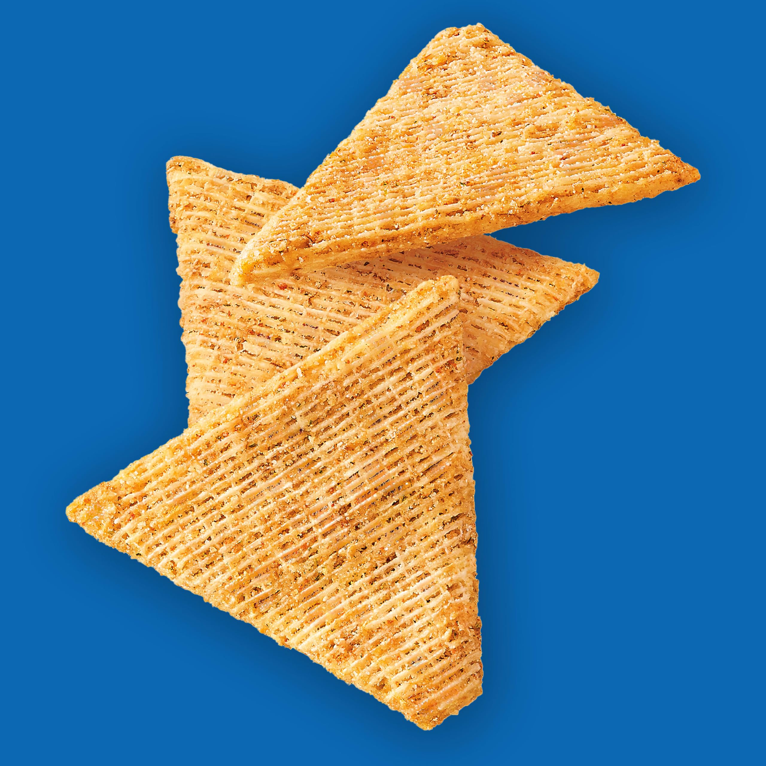 Triscuit cracker topped with hummus showcasing brand pairing for nutritious snacks