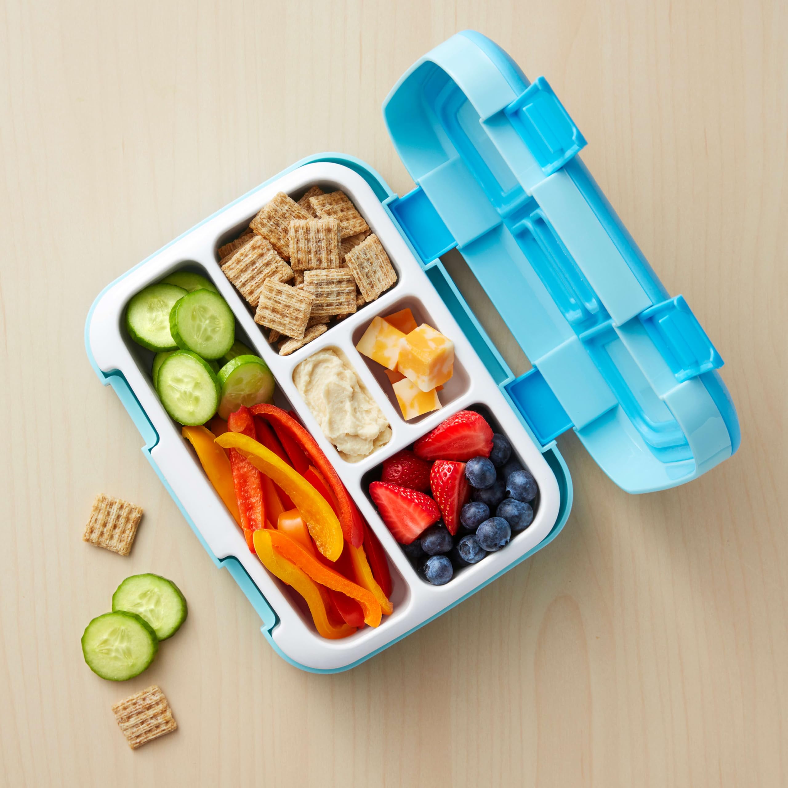 Stacked Triscuit Minis showing thickness and sturdy crunch