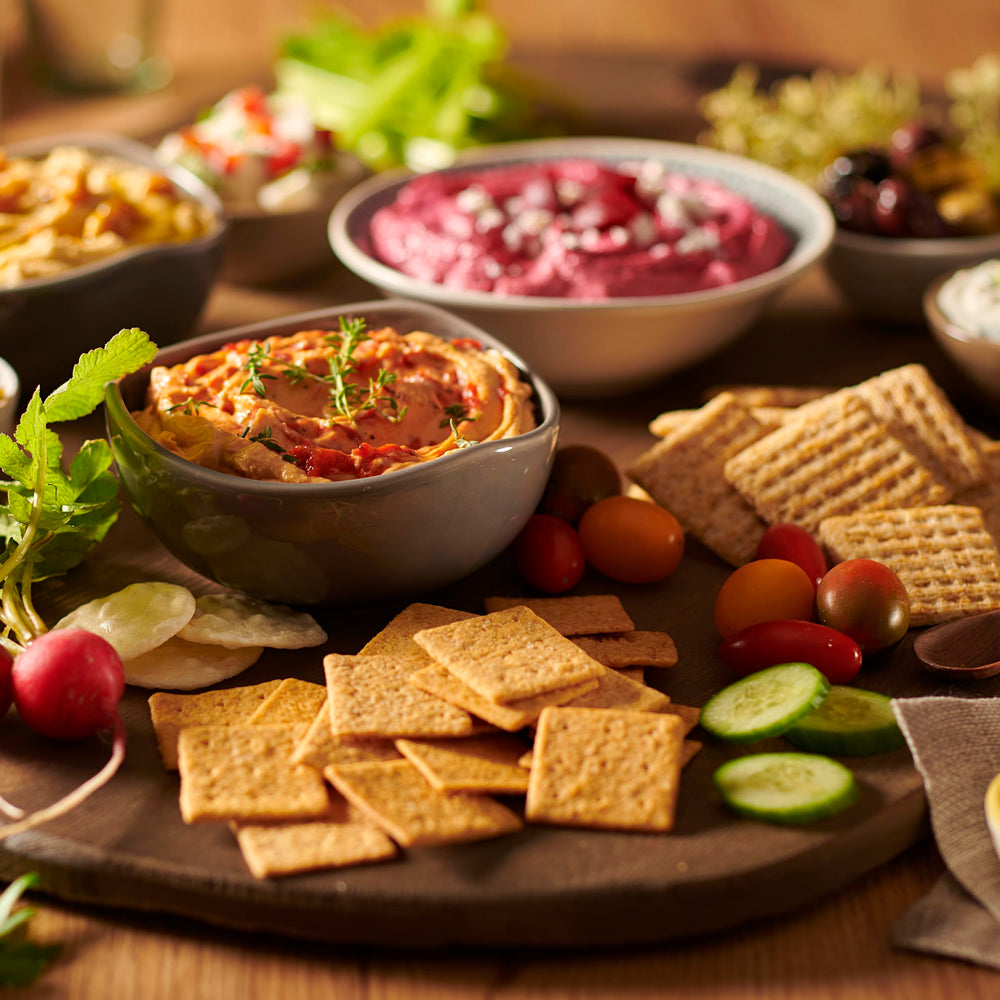 Triscuit and Wheat Thins on charcuterie board offering pairing ideas and entertaining ease
