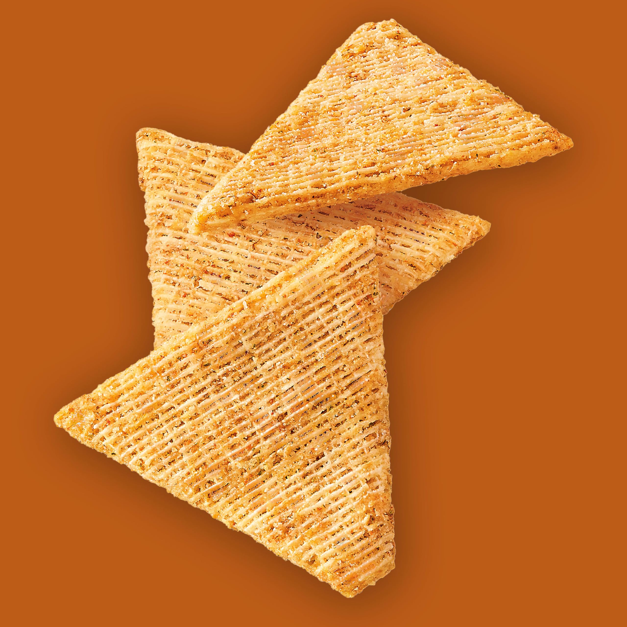 Triscuit on serving board with meats and fruit for party convenience