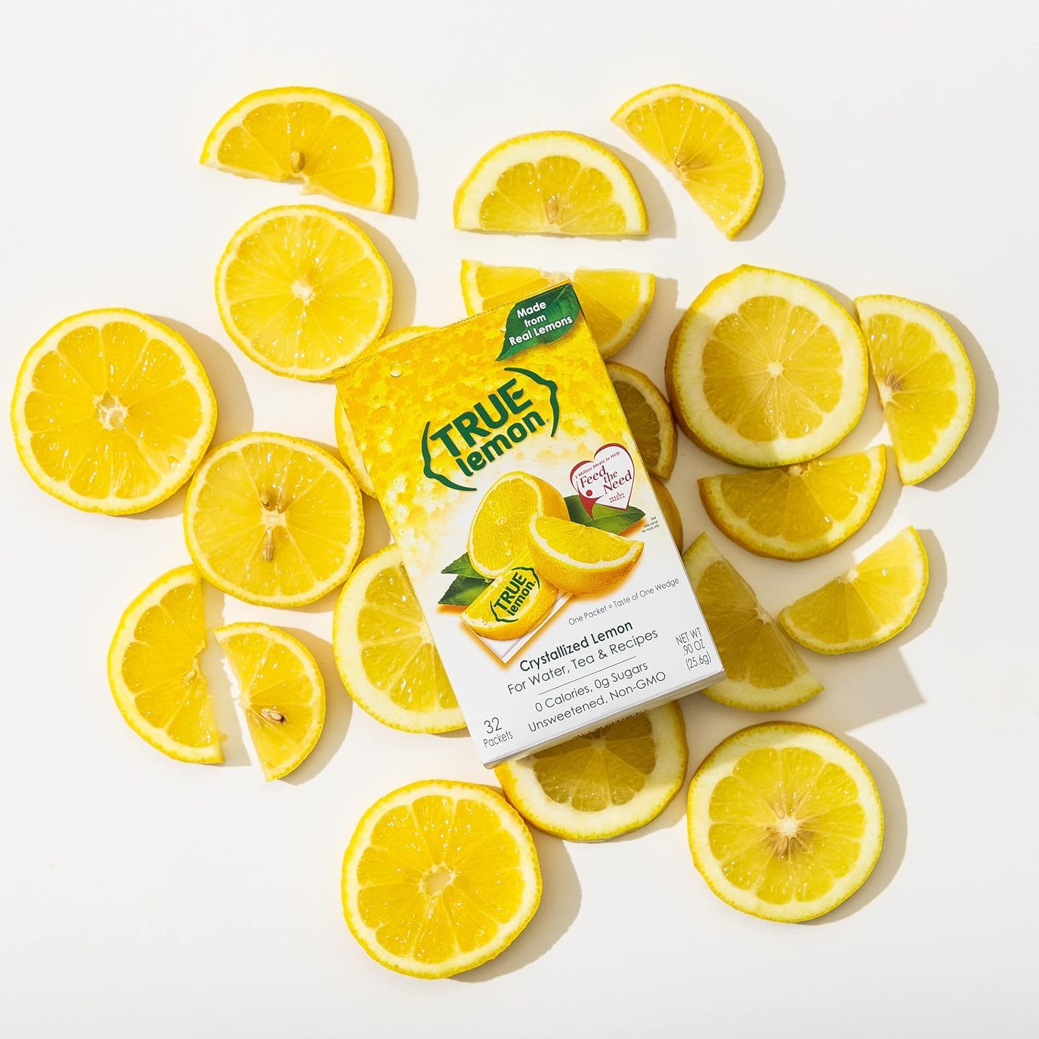 True Citrus crystals beside a fresh lemon for scale, consistent lemon intensity benefit