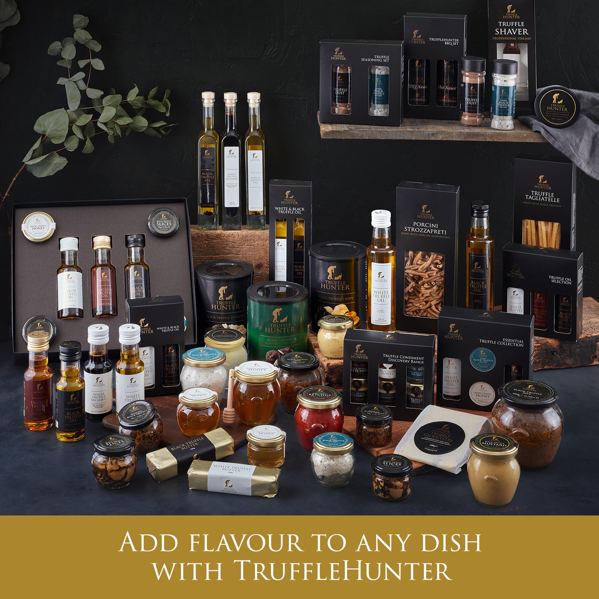 TruffleHunter drizzling truffle oil over pasta to show instant flavor enhancement