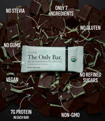 Unwrapped Truvani Chocolate Mint bar close-up revealing dense texture and chocolate coating for satisfying bites