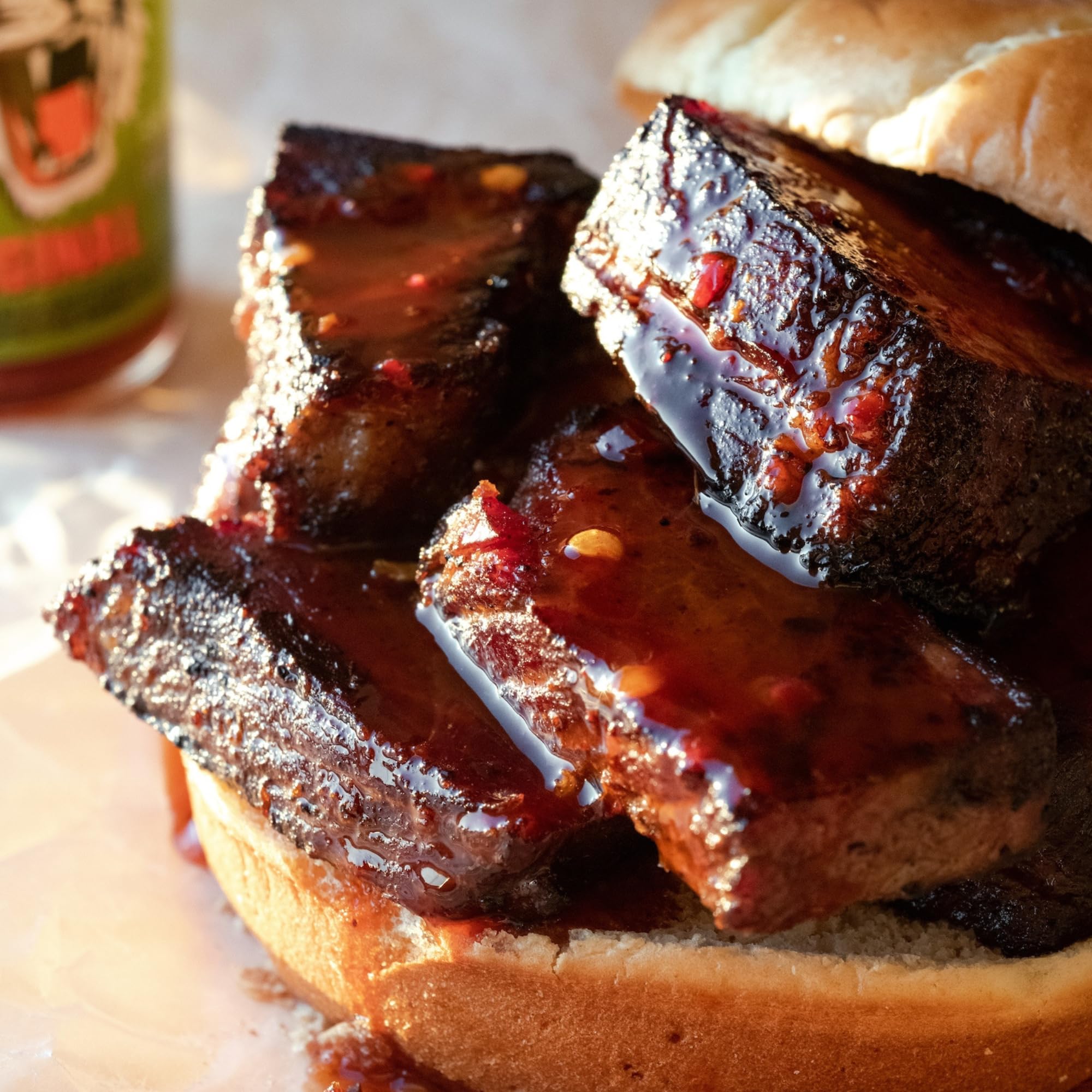 Try Me Tiger Sauce texture poured from bottle, demonstrating pourable consistency and shine