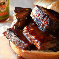 Try Me Tiger Sauce texture poured from bottle, demonstrating pourable consistency and shine