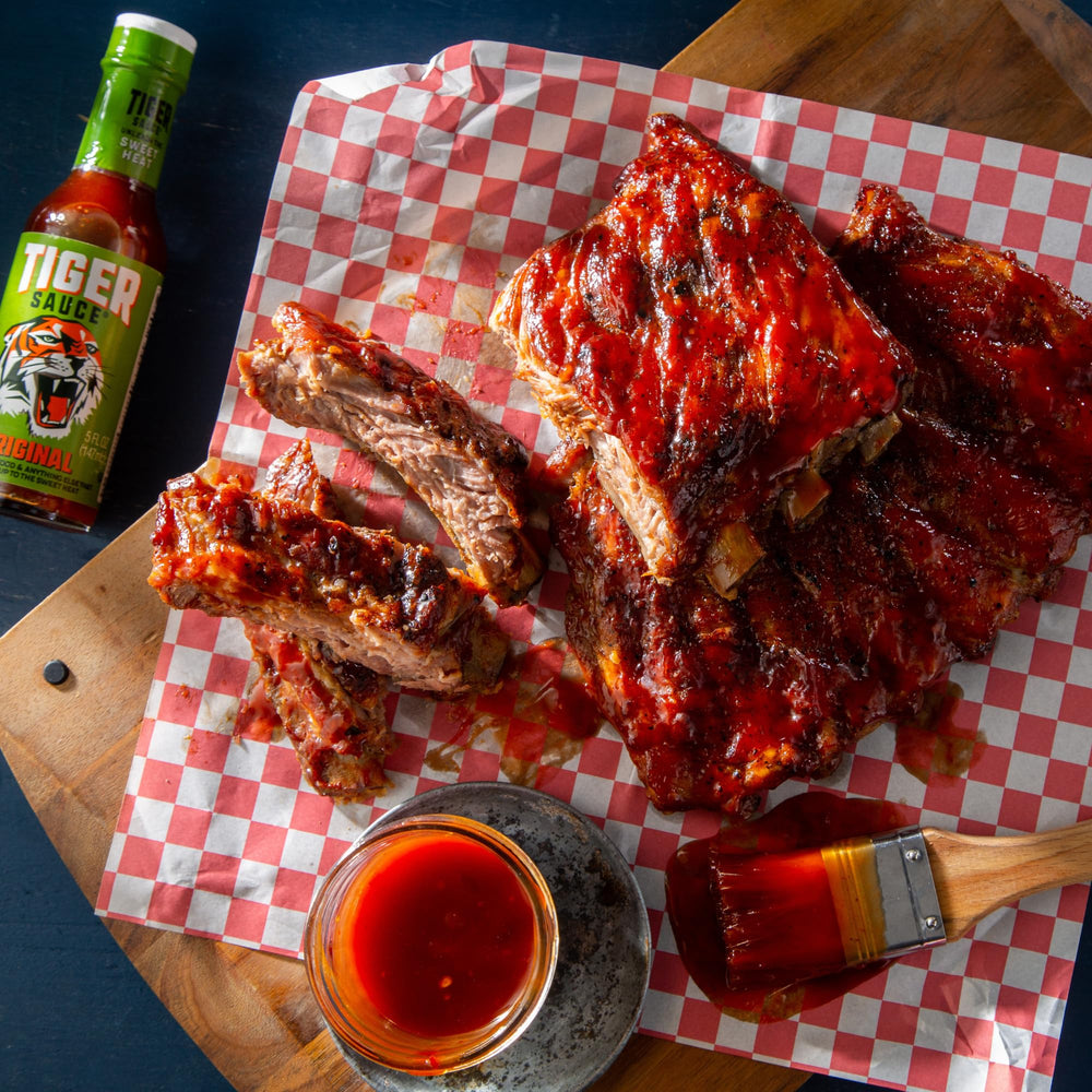 Try Me Tiger Sauce drizzled on sandwich, adding sweet-heat and improved taste