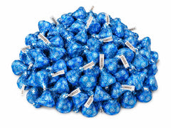 Tundras Hershey Kisses close-up of wrapper and surface texture, highlights creamy filling