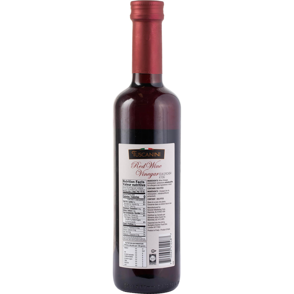Tuscanini bottle next to apples to show 16.9oz scale and portioning