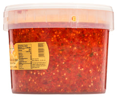 TUTTOCALABRIA crushed chili close-up texture highlighting coarse pieces and vibrant color benefit