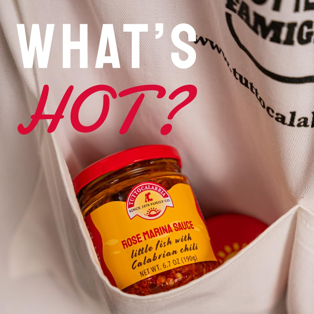TUTTOCALABRIA spoonful of sauce highlighting texture and spicy-fishy aroma benefit