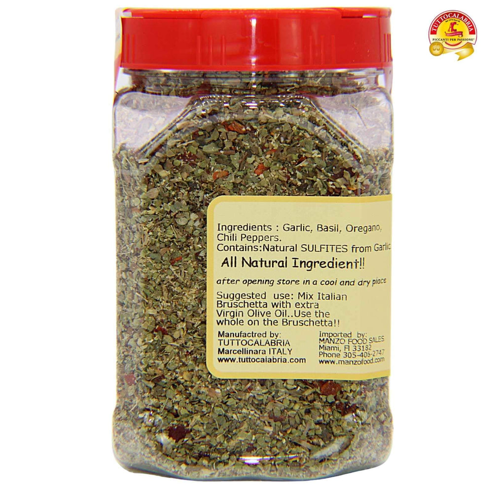 TUTTOCALABRIA seasoning sprinkled over spaghetti bowl adding authentic Calabrian heat and color