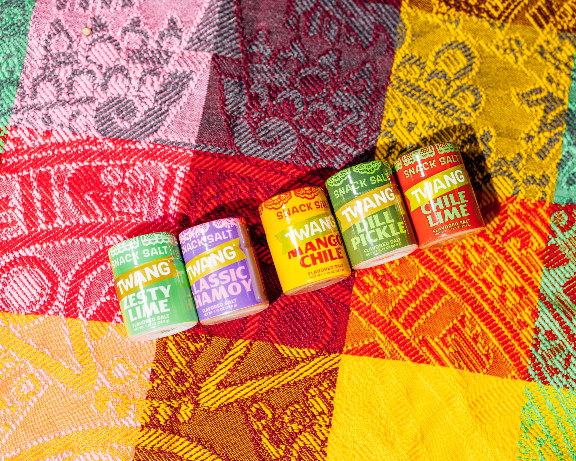 Twang lime dusted on fresh mango showing sweet-tart pairing and flavor contrast