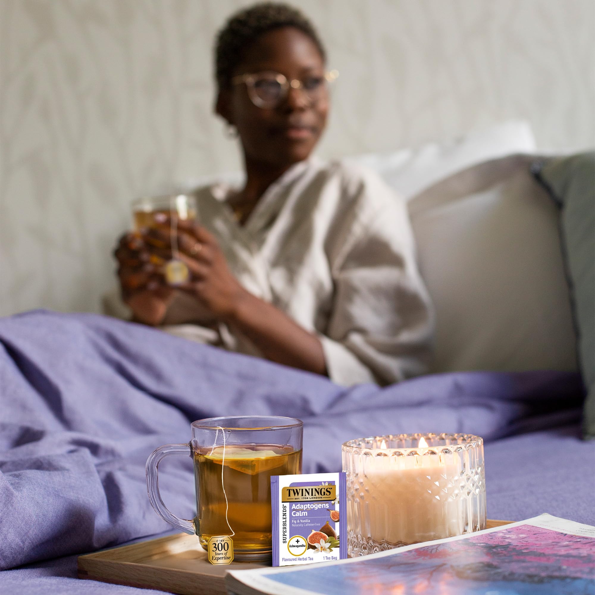 Twinings brewed cup of tea with steam showing rich color and comforting, mellow flavor benefit