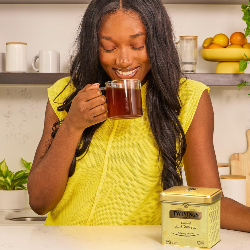 Twinings tin held in hand for size comparison, Twinings travel-friendly portion