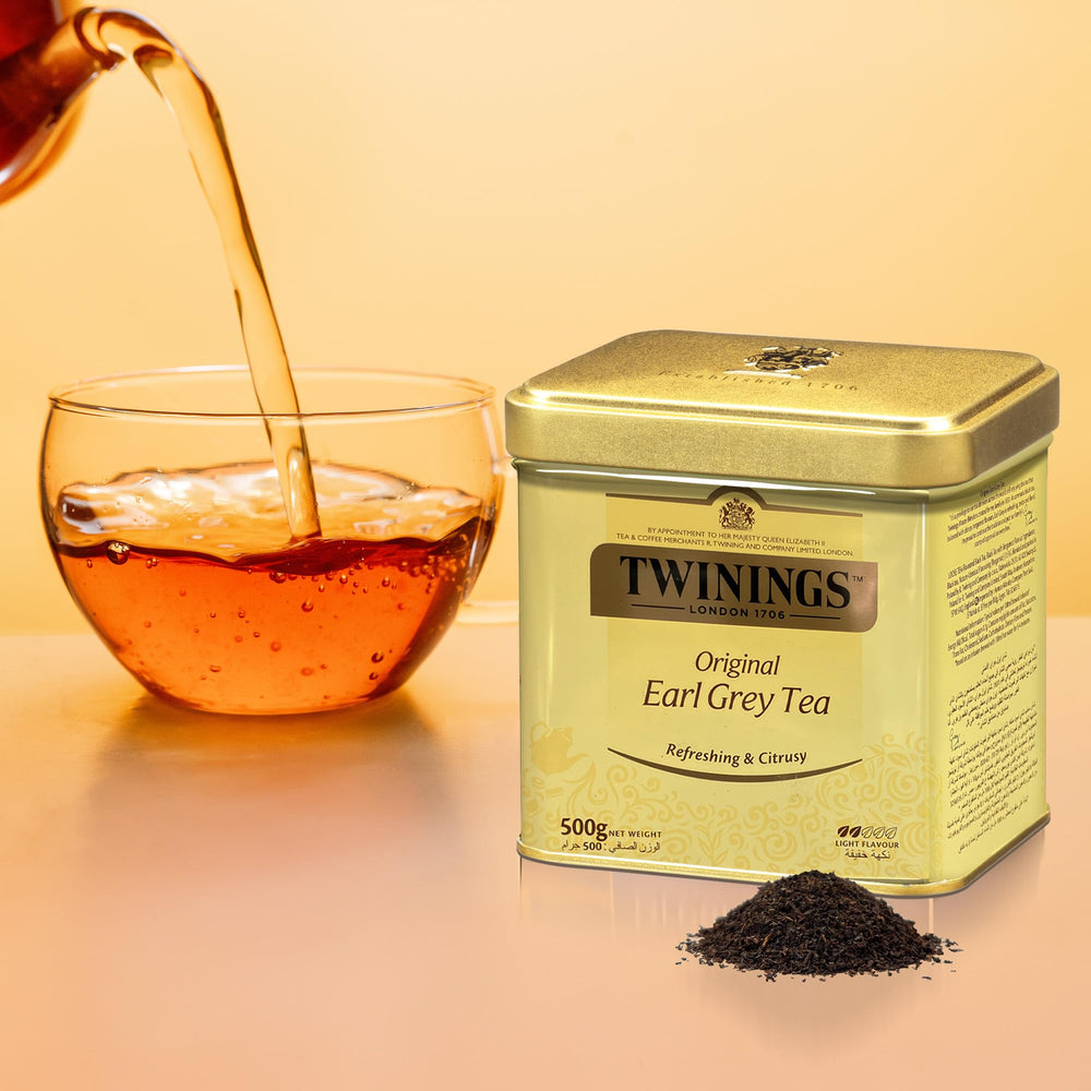 Twinings tin open with spoonful of leaves, easy scoop and portioning