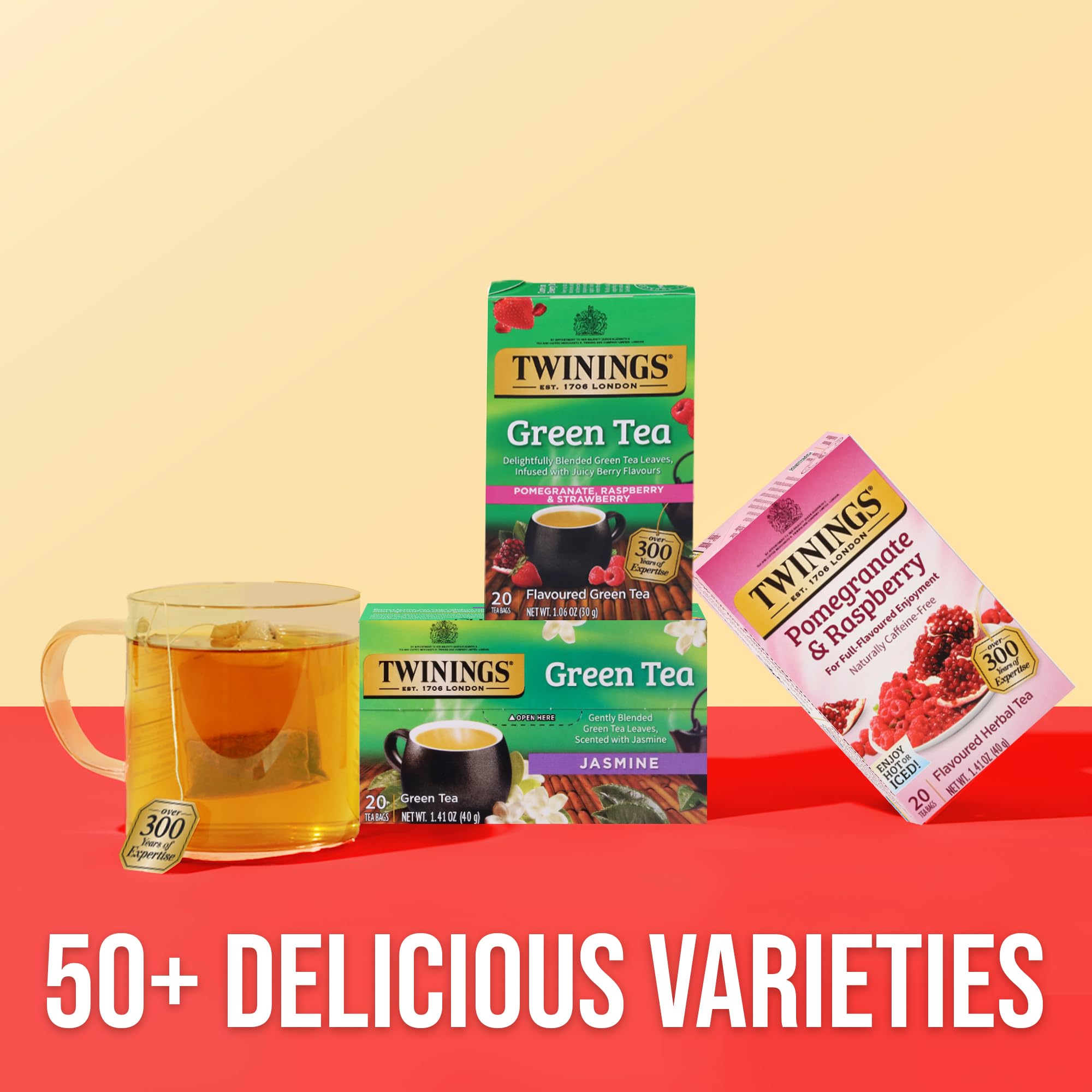 Six-box Twinings pack beside common objects to show scale and long-lasting supply for households