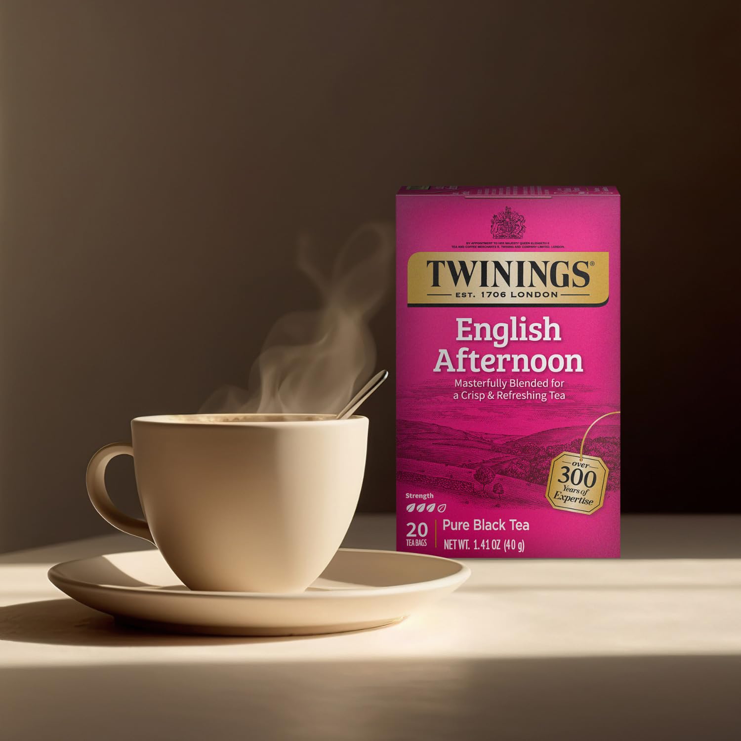 Twinings pouring kettle into cup, illustrates easy brewing preparation