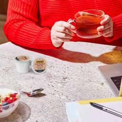 bowl-like cup of brewed Twinings rooibos showing rich color and comforting warmth