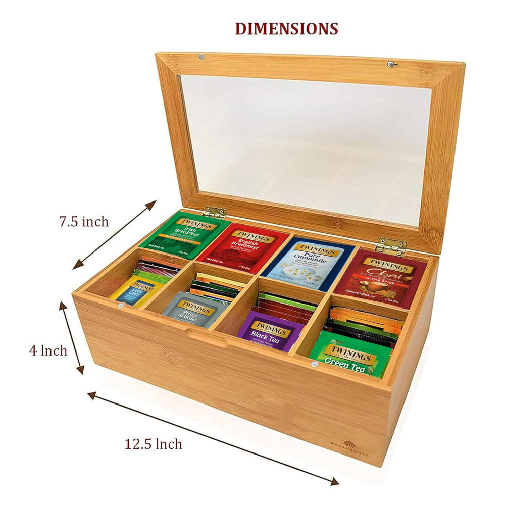 Hand holding Twinings bamboo box showing compact size and portability