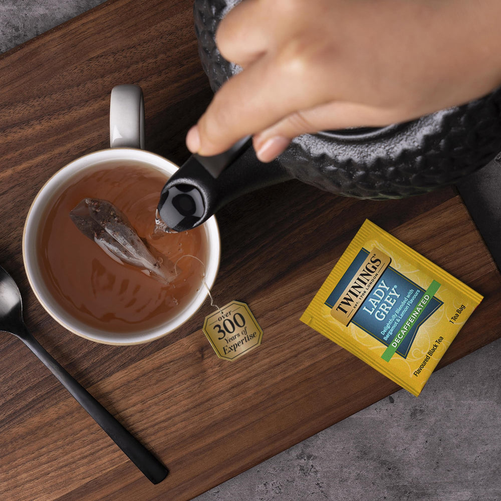 Twinings box in hand showing compact, travel-friendly size