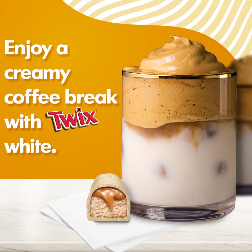 Close-up cross section of TWIX white chocolate showing crunchy cookie and caramel
