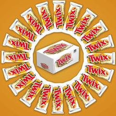 Pile of individually wrapped TWIX white chocolate singles ready to share