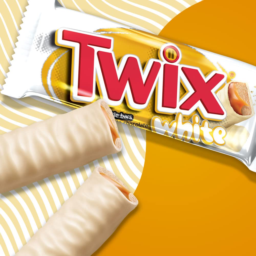 Unwrapped TWIX white chocolate bar revealing caramel and cookie center benefit