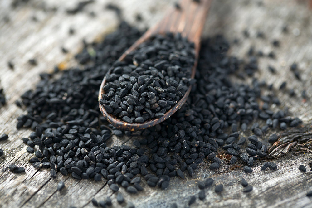 U.S. Wellness Naturals close-up of nigella seed texture highlighting aromatic detail