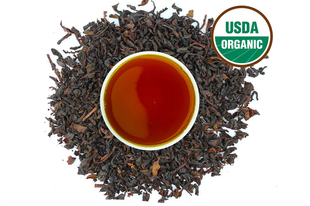 U.S. Wellness Naturals close-up of loose Ceylon leaves and bergamot pieces enhancing aroma