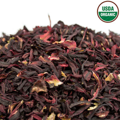 U.S. Wellness Naturals brewed cup with deep ruby color demonstrating vibrant infusion