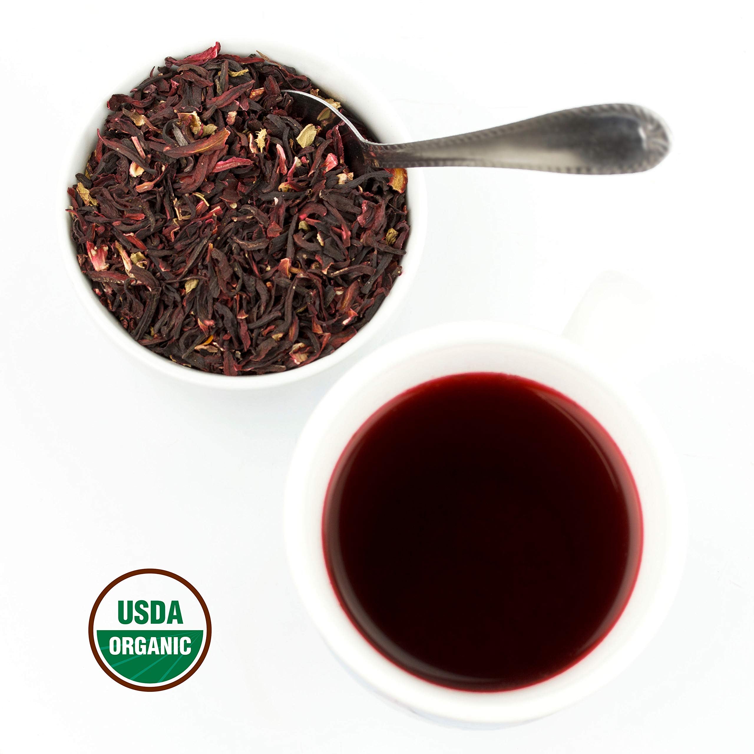 U.S. Wellness Naturals teaspoon with hibiscus next to bag for scale and servings