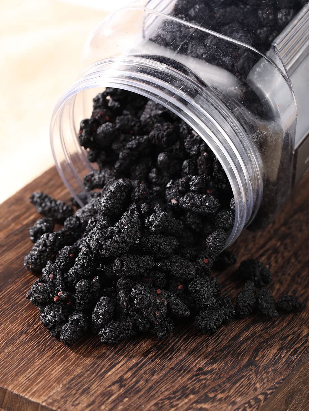 ULTHMOK mulberries beside a coin for scale showing large berries and portion expectation