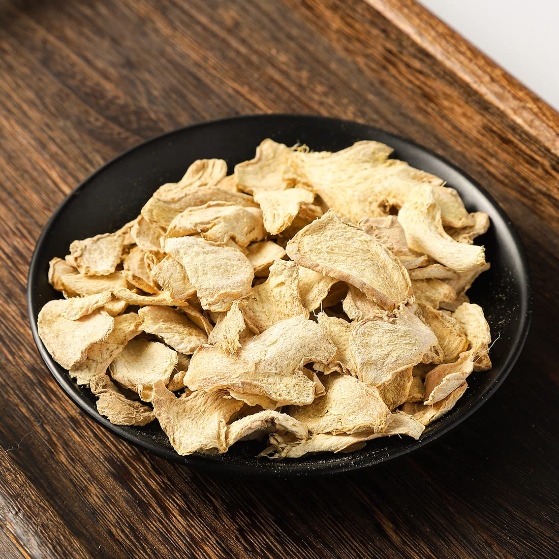 ULTHMOK texture detail of ginger slice edge, demonstrates concentrated flavor
