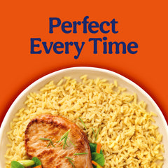 UNCLE BEN'S opened pouch with rice spilling ready to serve quickly
