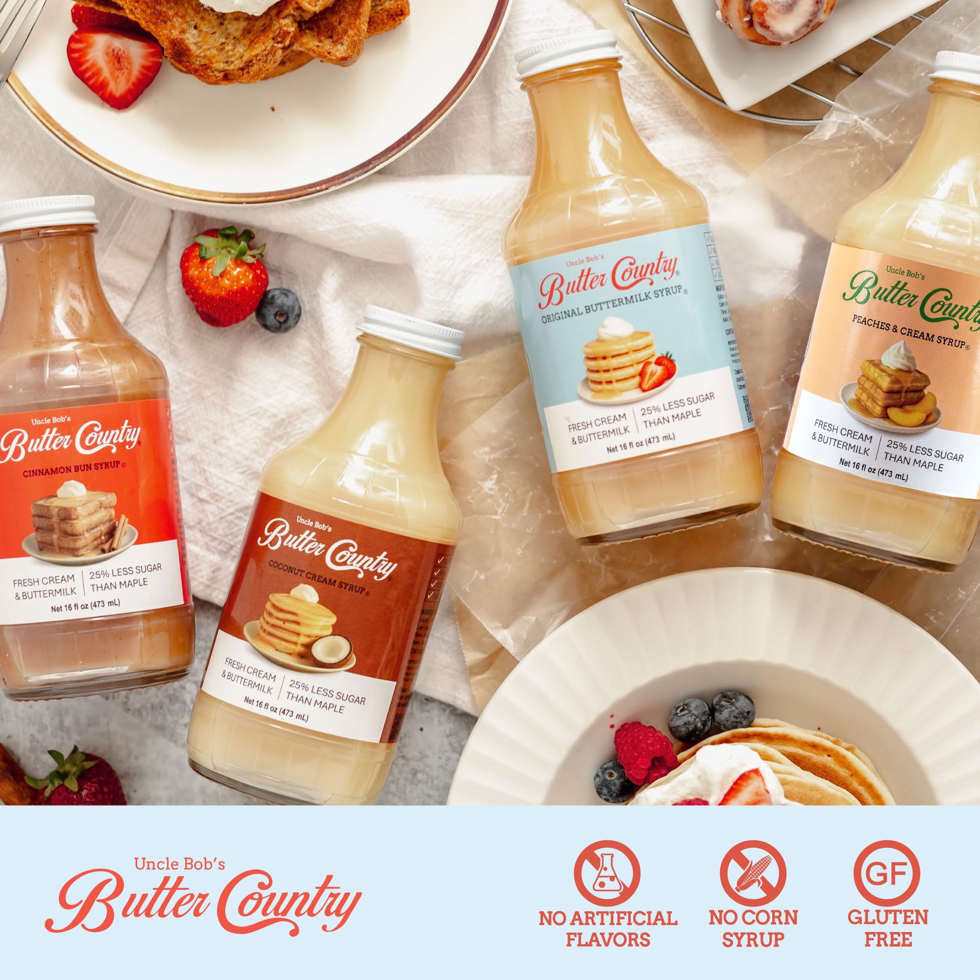 Uncle Bob's Butter Country bottles next to a stack of pancakes showing 16 fl oz size benefit